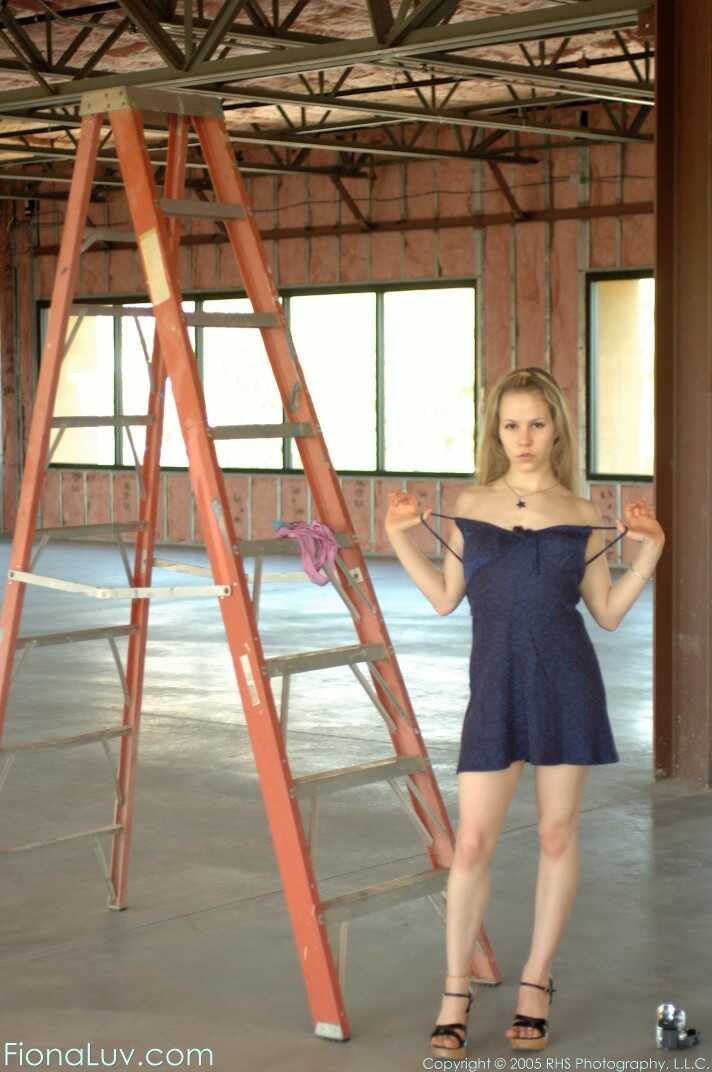 Amateur model gets naked on a stepladder while wearing shoes