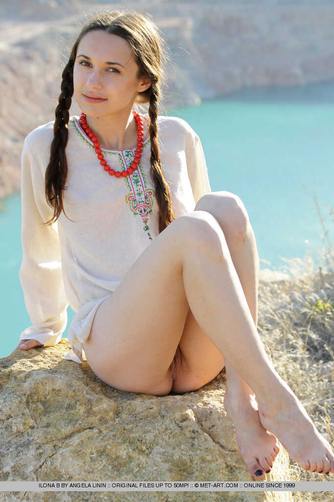 Teen model Ilona B poses nude in pigtails high above ocean waters, hairy teen pussy and ass! - Ilona B