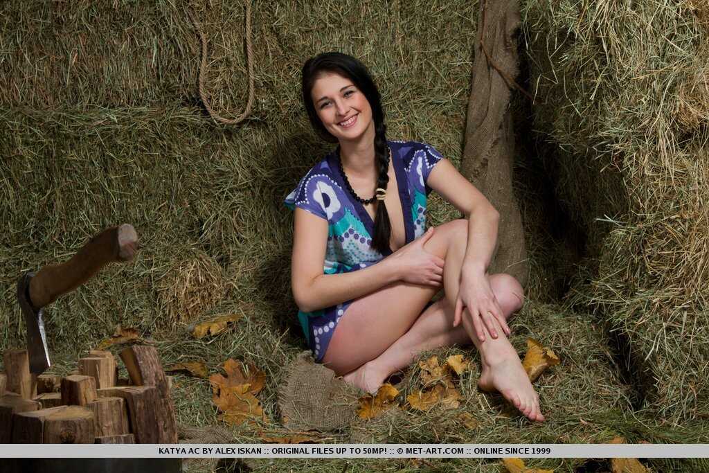 Dark haired Russian teen Katya Ac gets totally naked in the hay room, hairy ass and pussy exposed for your pleasure!