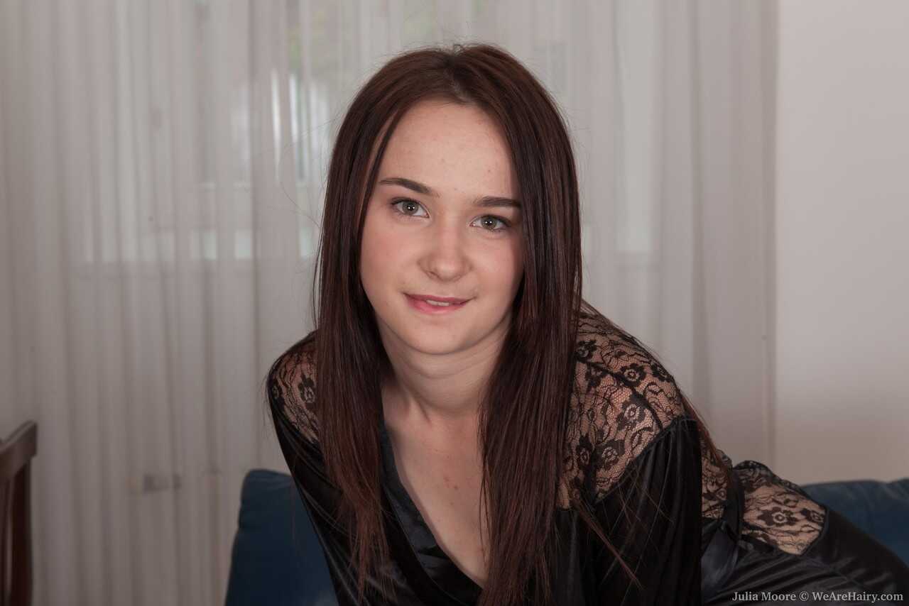 Young amateur brunette Julia Moore spreads her legs and pulls down her satin panties to show off her hairy pussy. - Julia ...