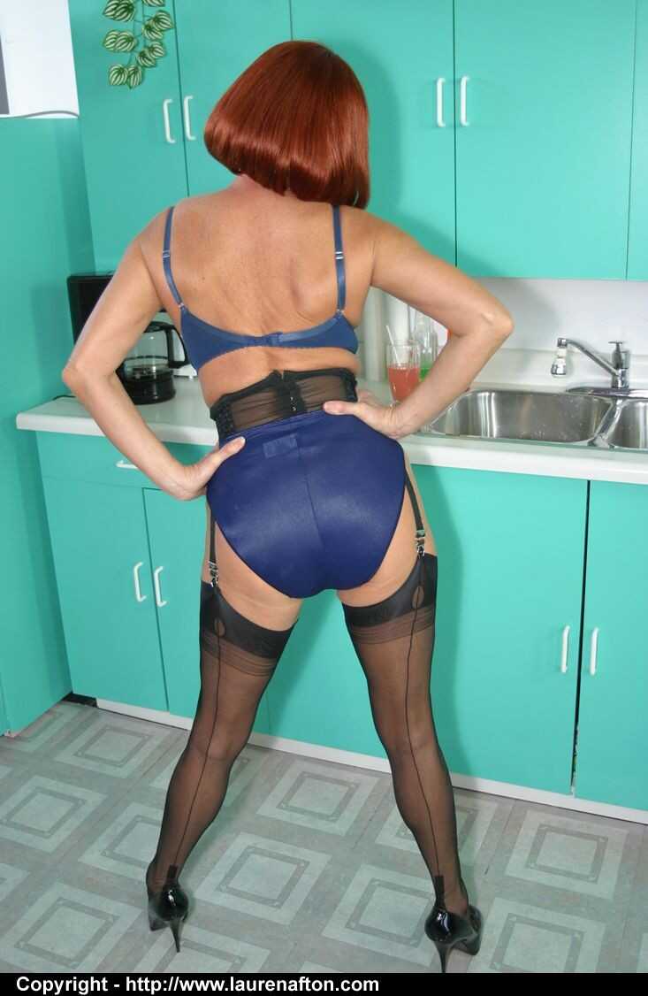 MILF Abigail in stockings & glasses shows off her hot panties while baking desserts in the kitchen - Lauren Afton