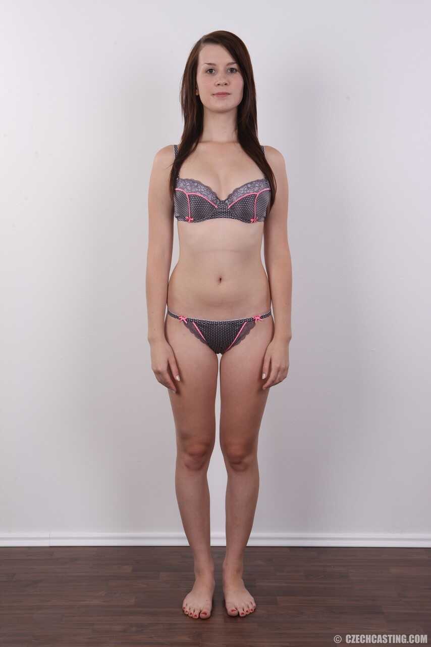 Straight-laced Lucie strips down to her micro thong, showing off her amateur ass - Lucie
