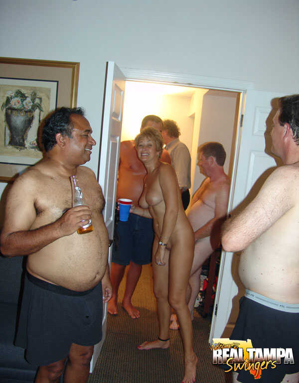 USA swinger Tracy Lick and her gf arrange an evening of drink and sex with mature MILFs: Mature Strapon Gangbang - Tracy L...