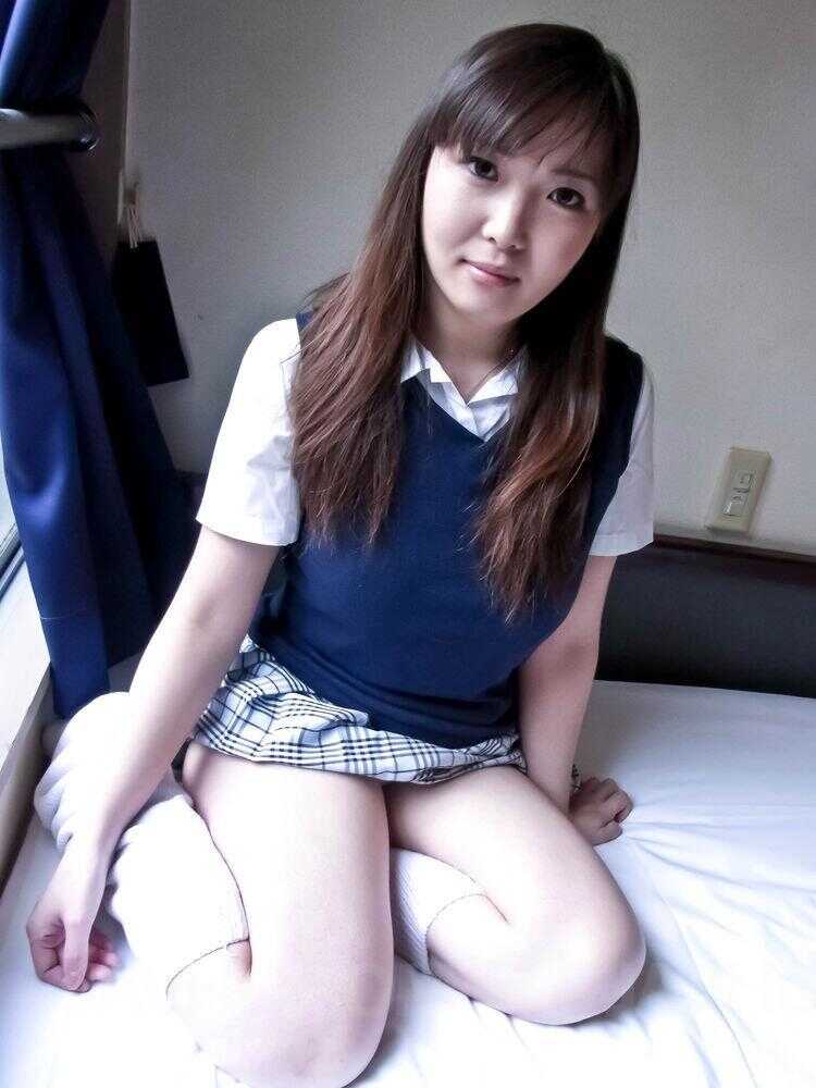 Japanese schoolgirl Haruka Ohsawa uncovers her fully developed breasts and reveals her sexy socks!