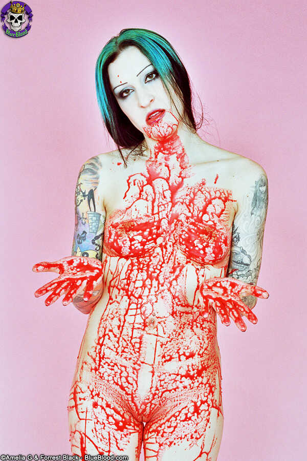 Bloodied Beauty: Tattooed Girl Jen Vixen Paints the Night Red with Her Own Blood