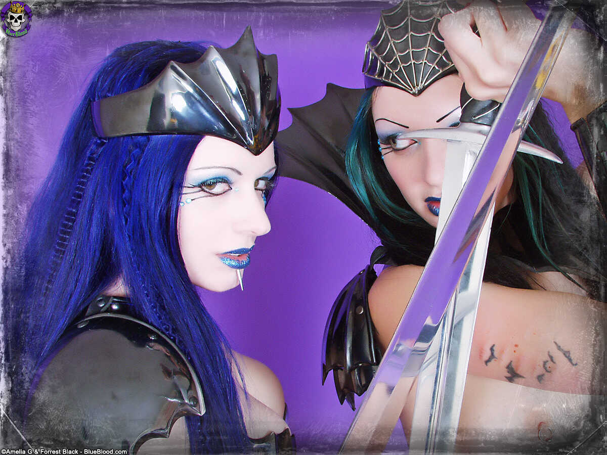 Sword-wielding Goth cosplayers Darenzia and Scar13 engage in intense lesbian action while dressed as sexy MILFs! - Darenzi...