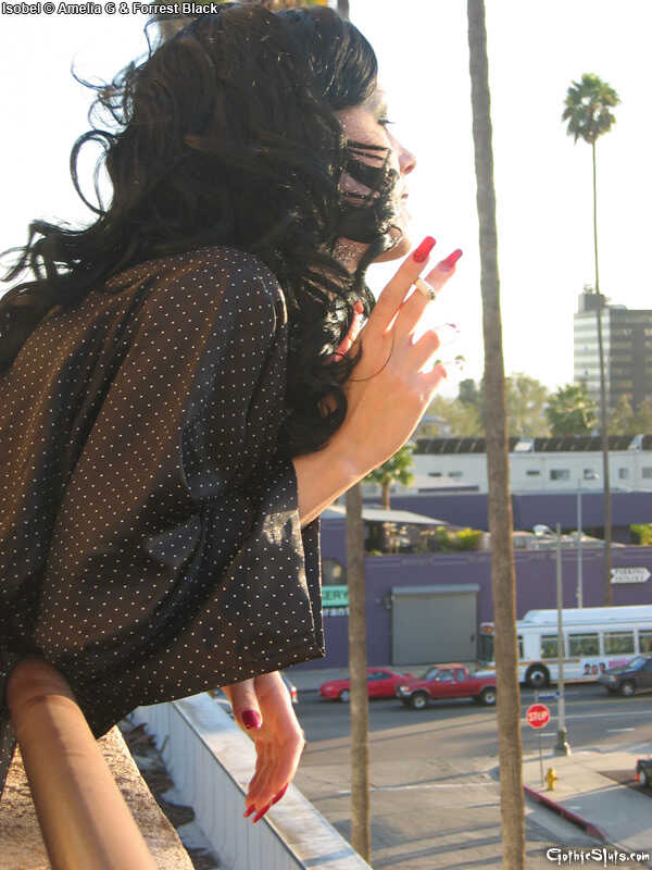 Goth Girl Isobel Marion Gets Handled by a Dark-Haired Gentleman in the Condo Balcony While Smoking Cigarette and Exposing ...