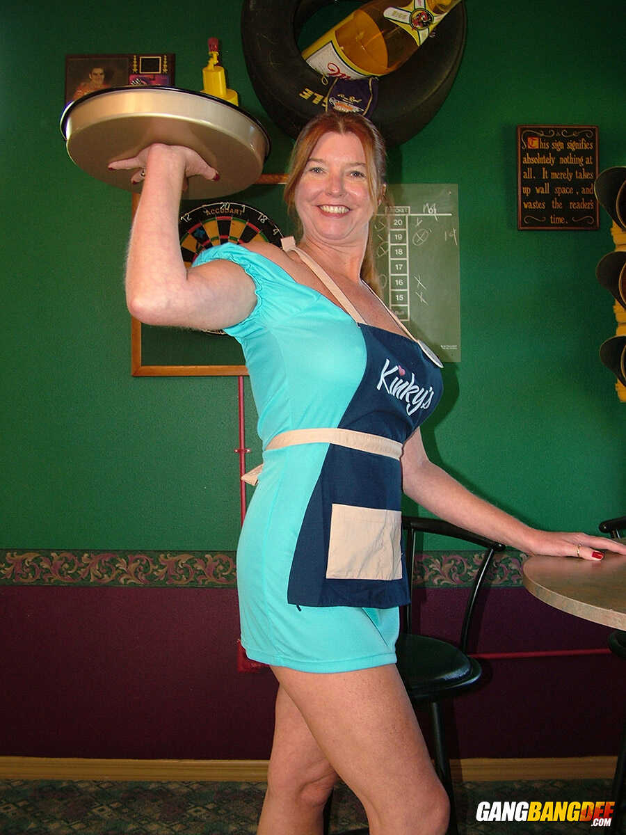 Mature Lady Dee Delmar's Racy Pub Show: A Big Tit Redhead MILF Goes Topless While Serving Customers! - Dee Delmar