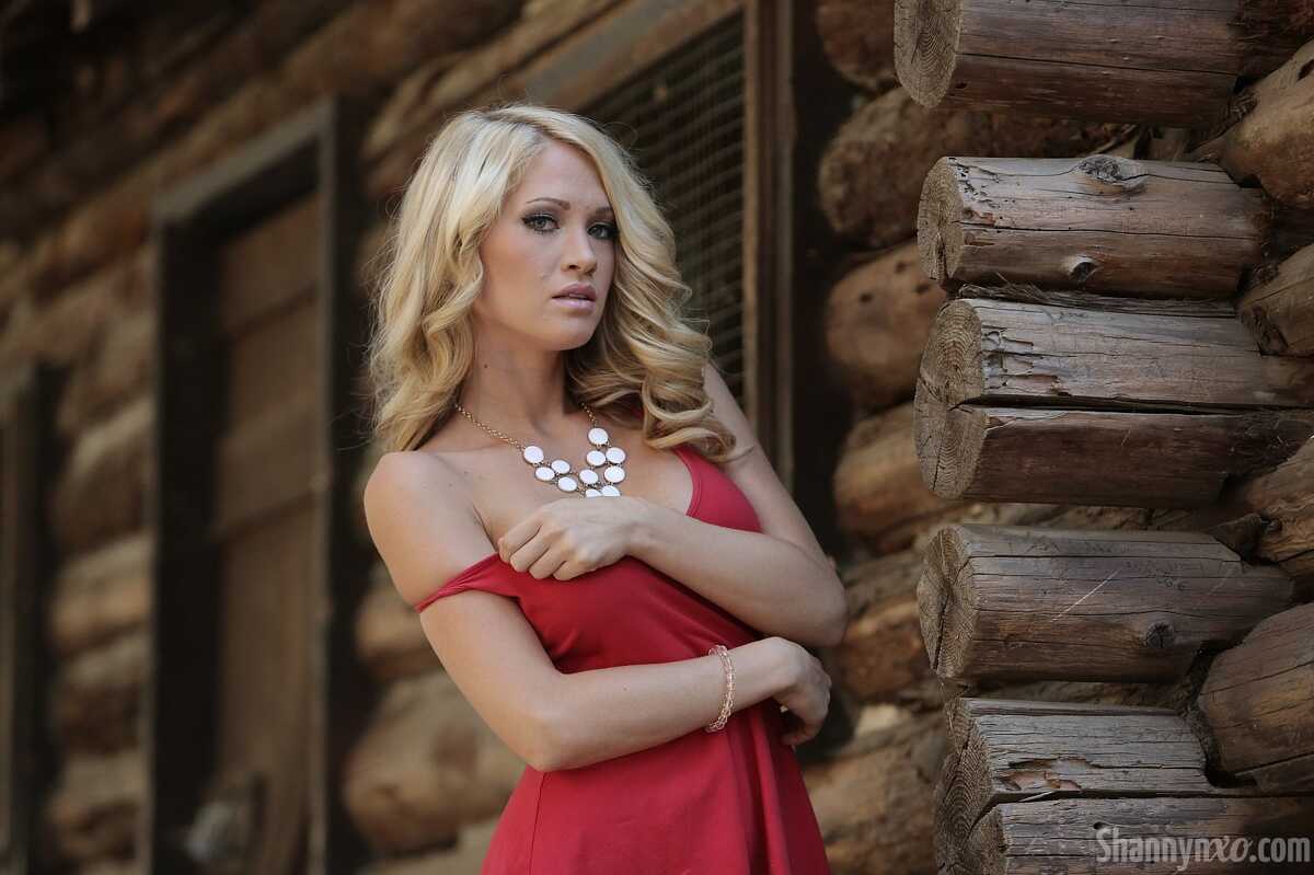 Bare Legged Blonde Shannyn Xo Flashes Her Pantie-less Crotch in Front of a Log Cabin - Shannyn Xo