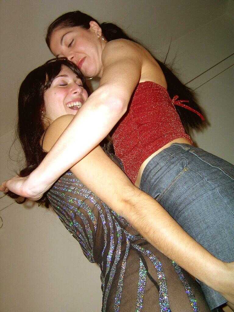 Strapon-fueled Brunette Lesbian Sex on the Sofa: The Ultimate Lesbian Porn Experience - 