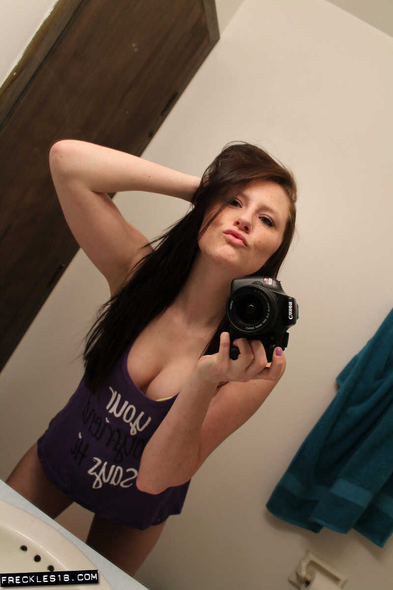 Freckles 18 sticks out her tongue while taking mirror selfies in her lingerie, giving us a sexy big tits selfie. - Freckle...