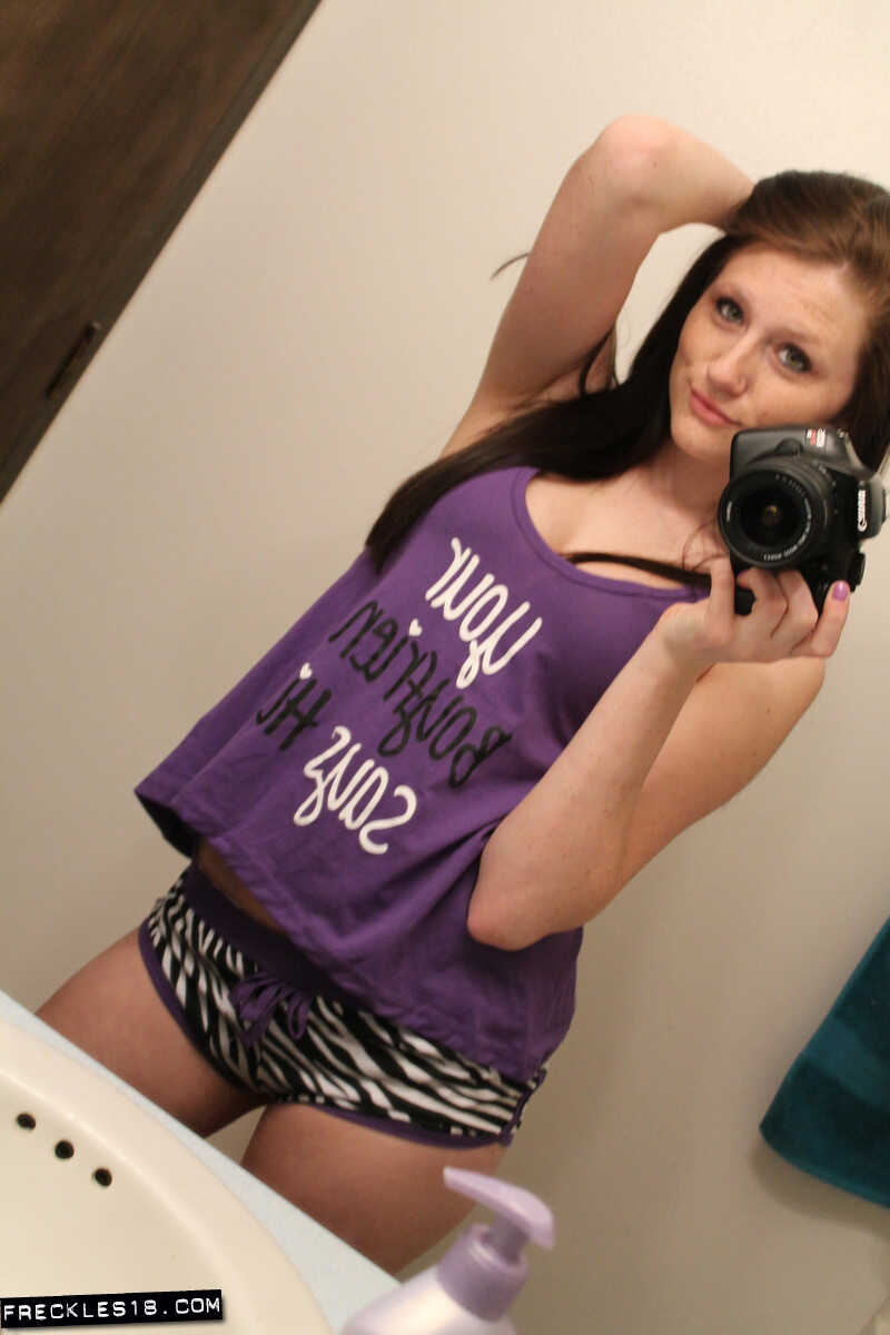 Freckles 18 sticks out her tongue while taking mirror selfies in her lingerie, giving us a sexy big tits selfie. - Freckle...