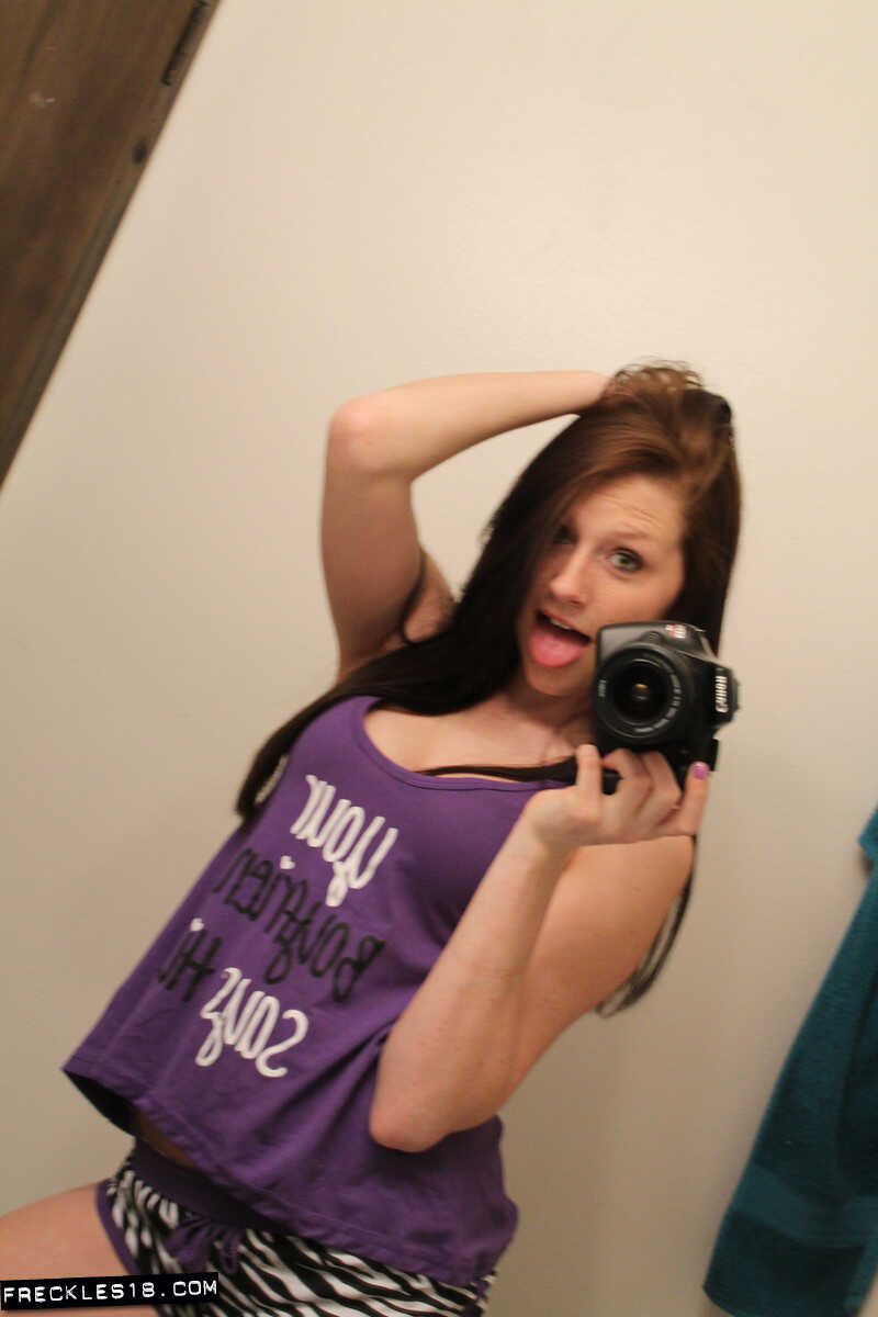 Freckles 18 sticks out her tongue while taking mirror selfies in her lingerie, giving us a sexy big tits selfie. - Freckle...