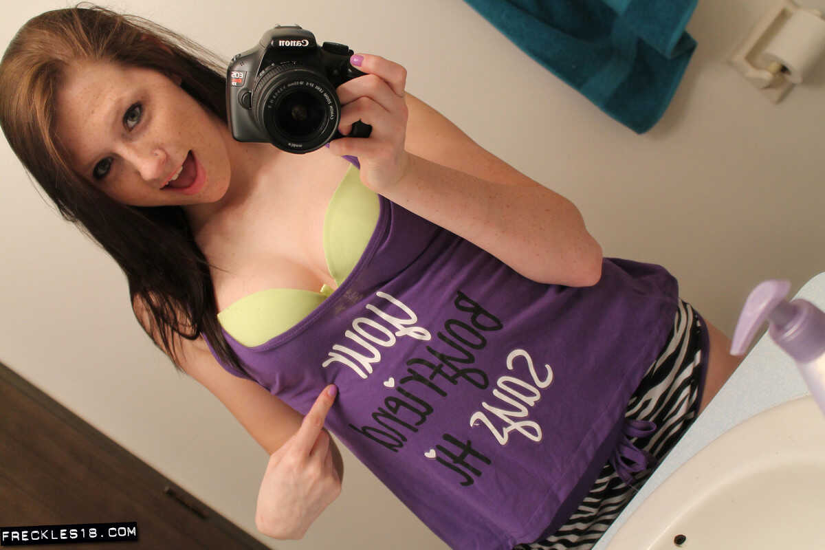 Freckles 18 sticks out her tongue while taking mirror selfies in her lingerie, giving us a sexy big tits selfie. - Freckle...