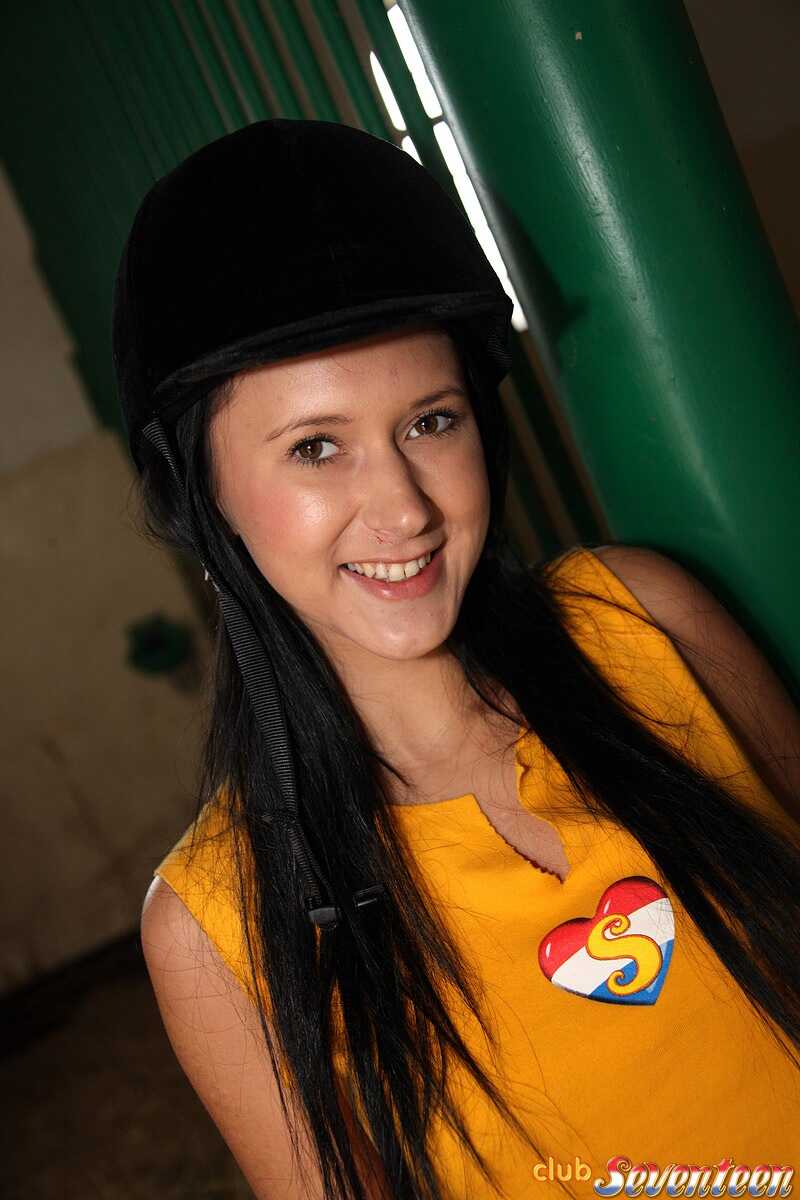 Busty teen masturbates with a dildo in the stables while wearing tight riding pants - 