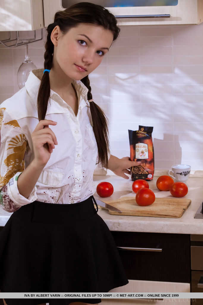 Cute Iva's pussy gets hungry while making lunch, so she strips naked and shows her hairy cunt! - Iva