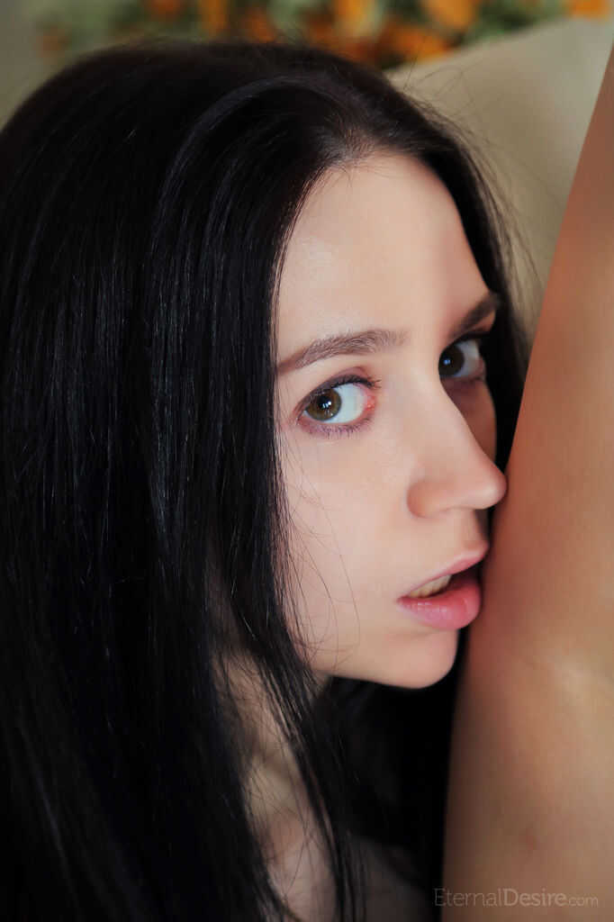 Dark haired teen Yassa spreads her legs to show her shaved pussy off  Dark Haired Yassa's Shaved Pussy Exposed - Yassa