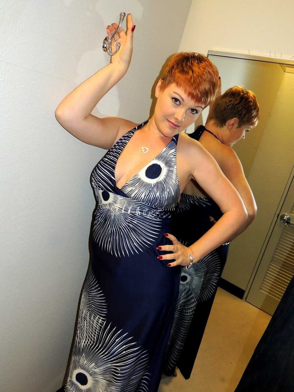 Red-haired Kali Devine sucks a cock in the changing room - Kali Devine