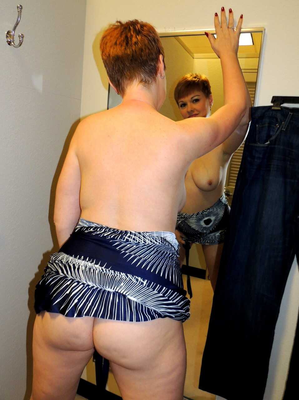 Red-haired Kali Devine sucks a cock in the changing room - Kali Devine