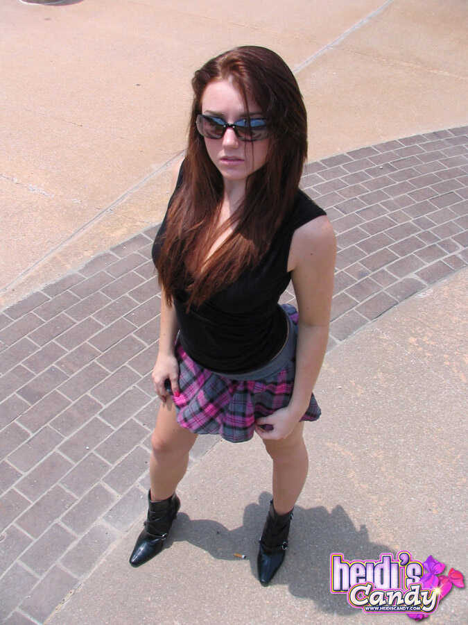 Young redhead Heidi flashes her thong clad ass on an overpass and teases you with her big tits in tight panties - Heidi