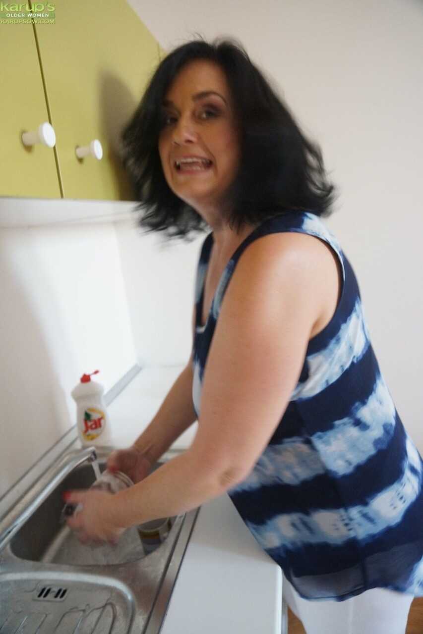 Ria's Finger-Fucking Fantasy: A Mature Housewife's Naughty Night After Doing the Dishes - Ria Black