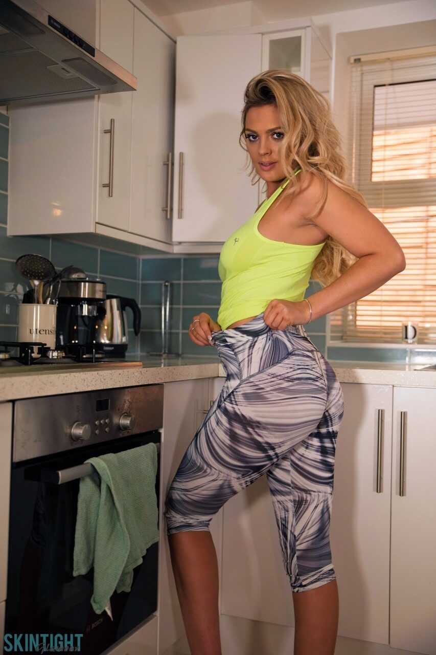 Busty Danielle Sellers Can't Keep Her Hands Off Her Juicy Booty in the Kitchen