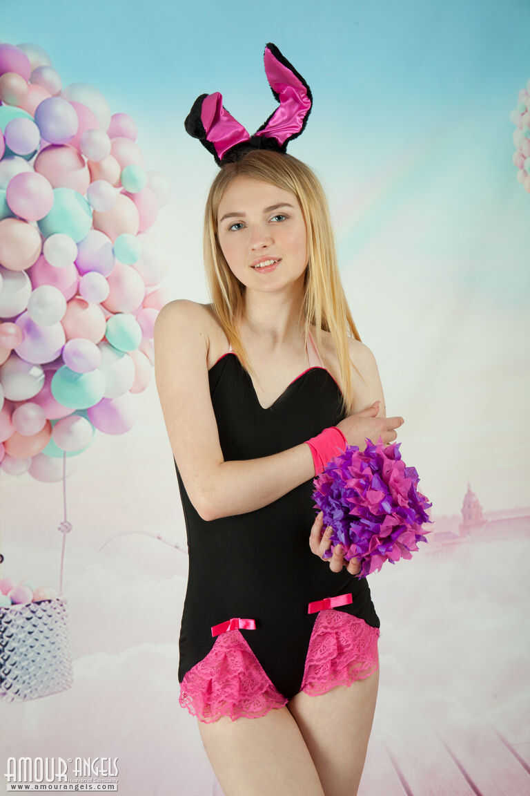 Exposing her innocent bunny ears, Lia strips naked and shows off her petite tits! - Lia Kate