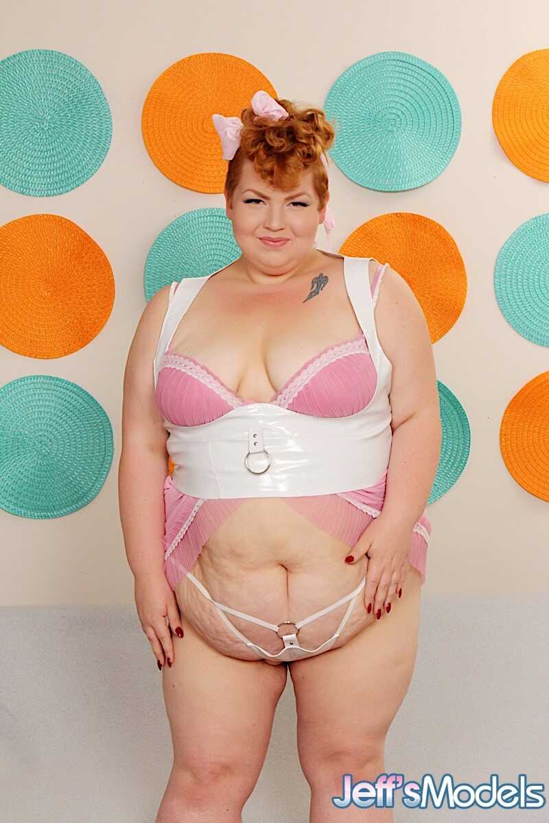 Obese redhead Velma Voodoo gets banged by a sex machine on a futon while her big saggy tits jiggle and her chubby big tits...