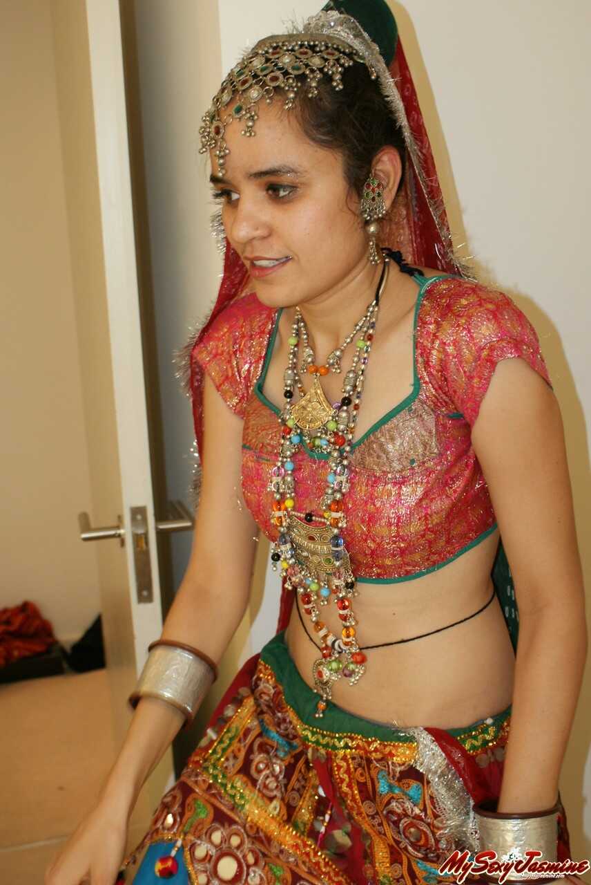 Jasmine’s Desi Erotica Young Indian Removes Ethnic Clothing and Poses Topless in Cotton Panties