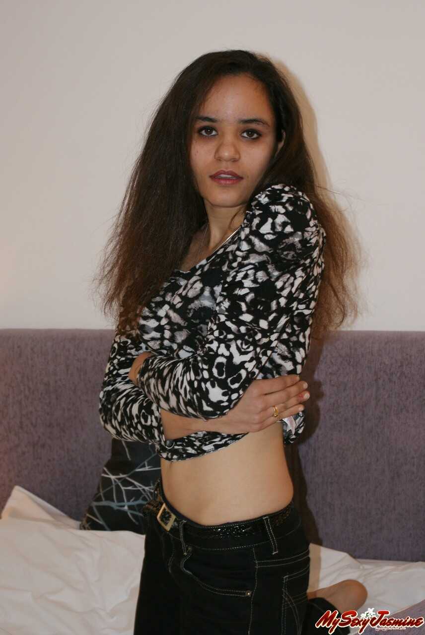 Uncensored Indulgence: The Sultry Indian Teen's Tiny Nipples Peeking Out of Her Black Lingerie - 