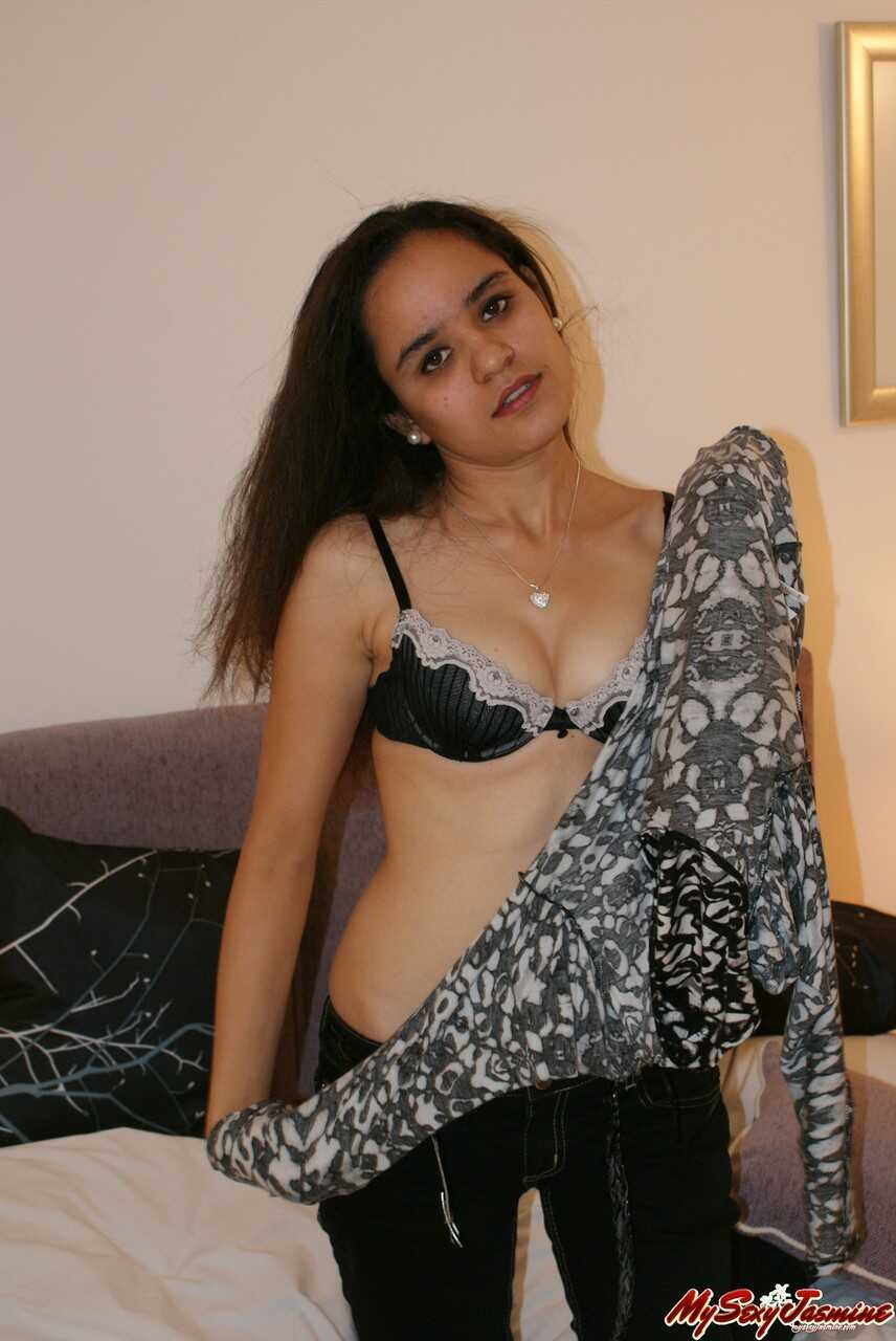 Uncensored Indulgence: The Sultry Indian Teen's Tiny Nipples Peeking Out of Her Black Lingerie - 