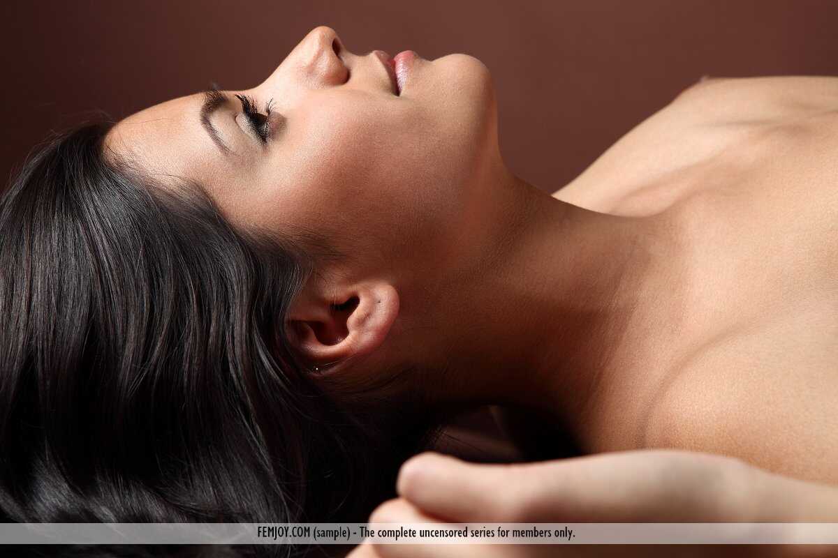 Alluring solo model Adrienne gets into the lotus position while posing naked - Adrienne