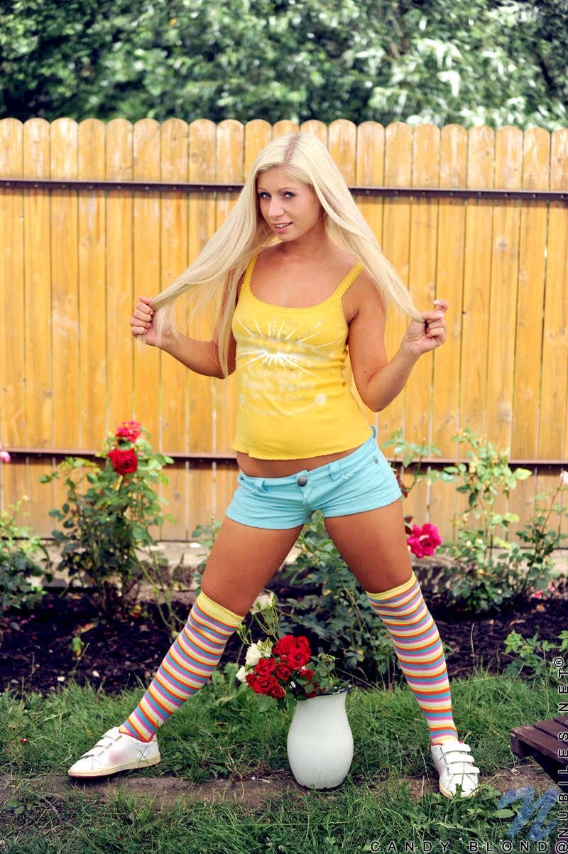 Candy's Striped Sock Slut Show: A Blonde Teen's Naughty Yard Display of Her Firm Tits and Twat - Candy Blond