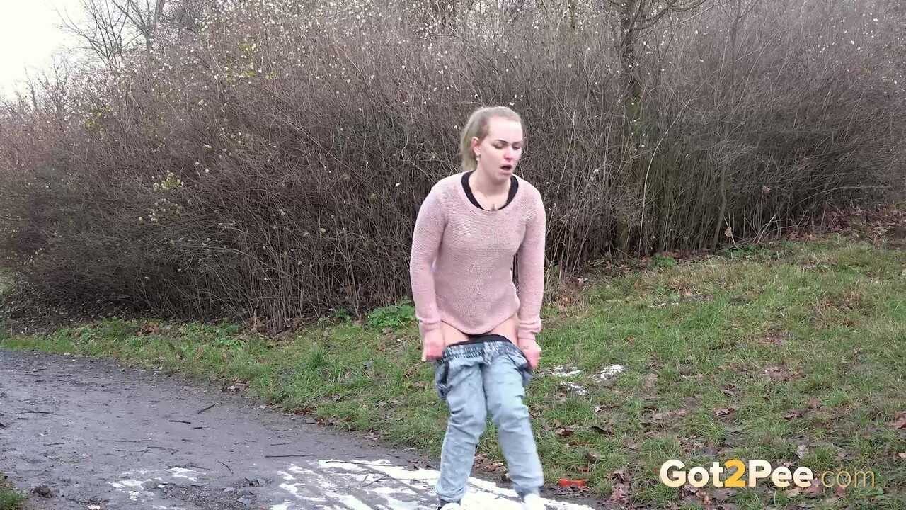 Debora's Natural Pee Break in the Muddy Woods - Debora