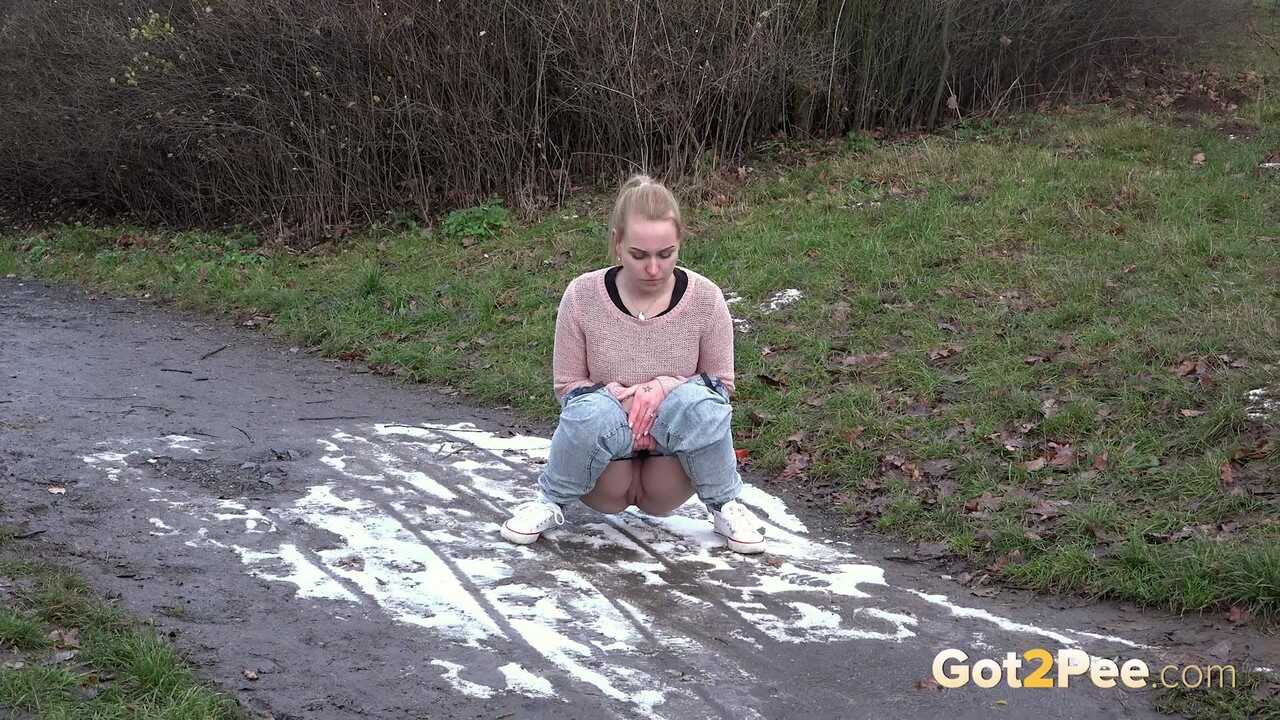 Debora's Natural Pee Break in the Muddy Woods - Debora