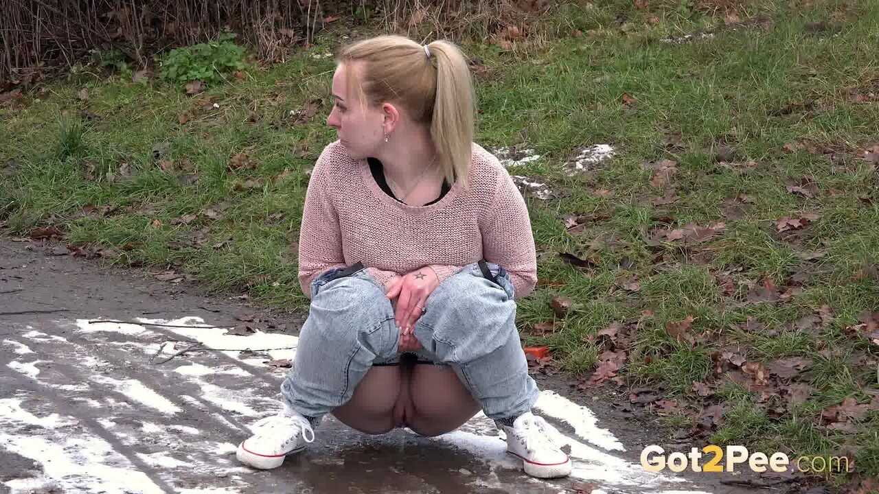 Debora's Natural Pee Break in the Muddy Woods - Debora