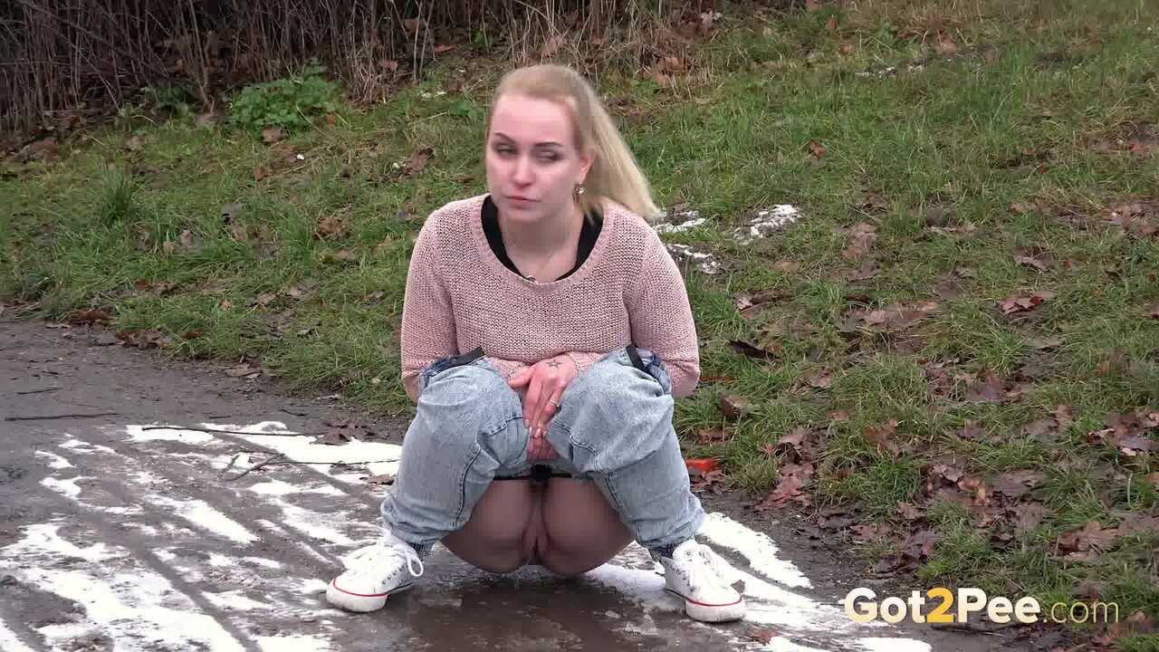 Debora's Natural Pee Break in the Muddy Woods - Debora