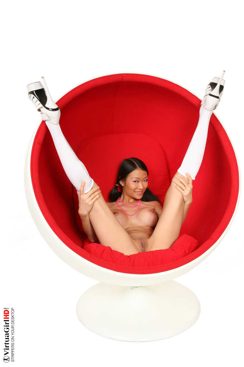 Skinny Asian schoolgirl Pussykat gets naked on an egg chair in socks and heels Fake Tits Edition - Pussykat