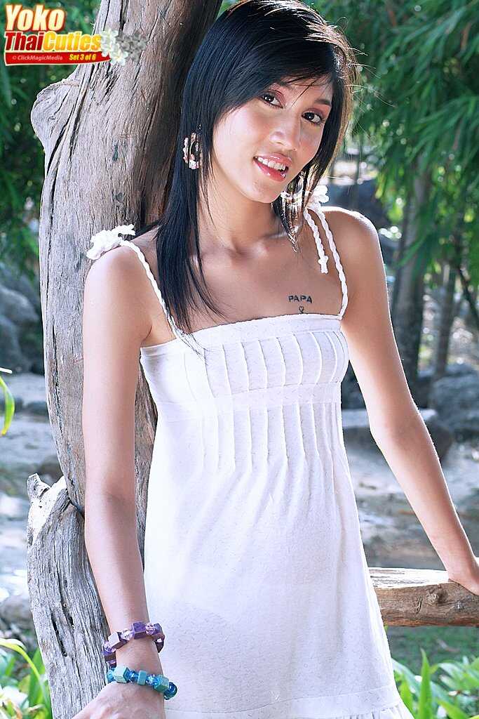 Sweet Thai girl Yoko picks up a dildo after getting totally naked with a tight Asian pussy - Yoko