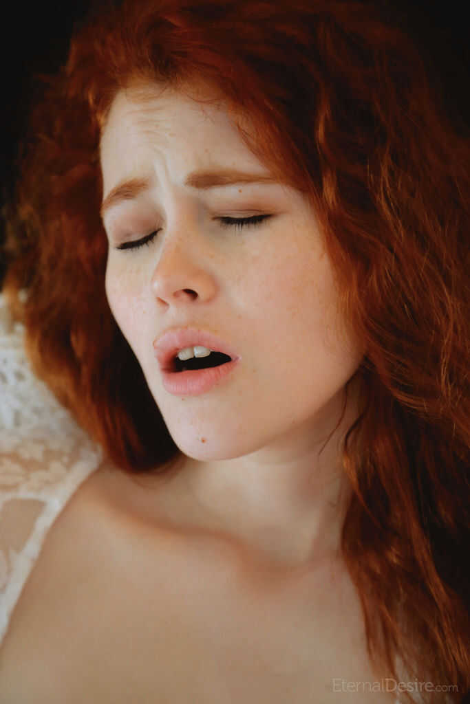 Redhead Adel C spreads her big ass in tight lingerie while masturbating for your pleasure - Adel C