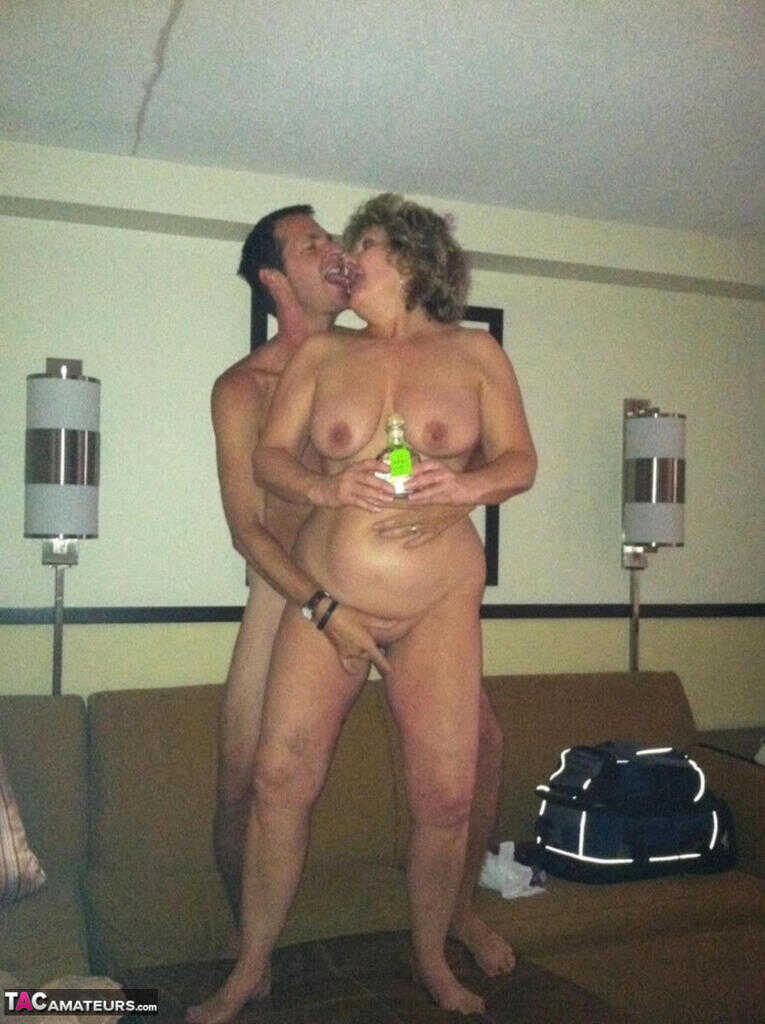 Horny granny BustyBliss oils up floppy tits & spreads pussy for hotel boy toy A Mature BBW GILF with big nipples and a...