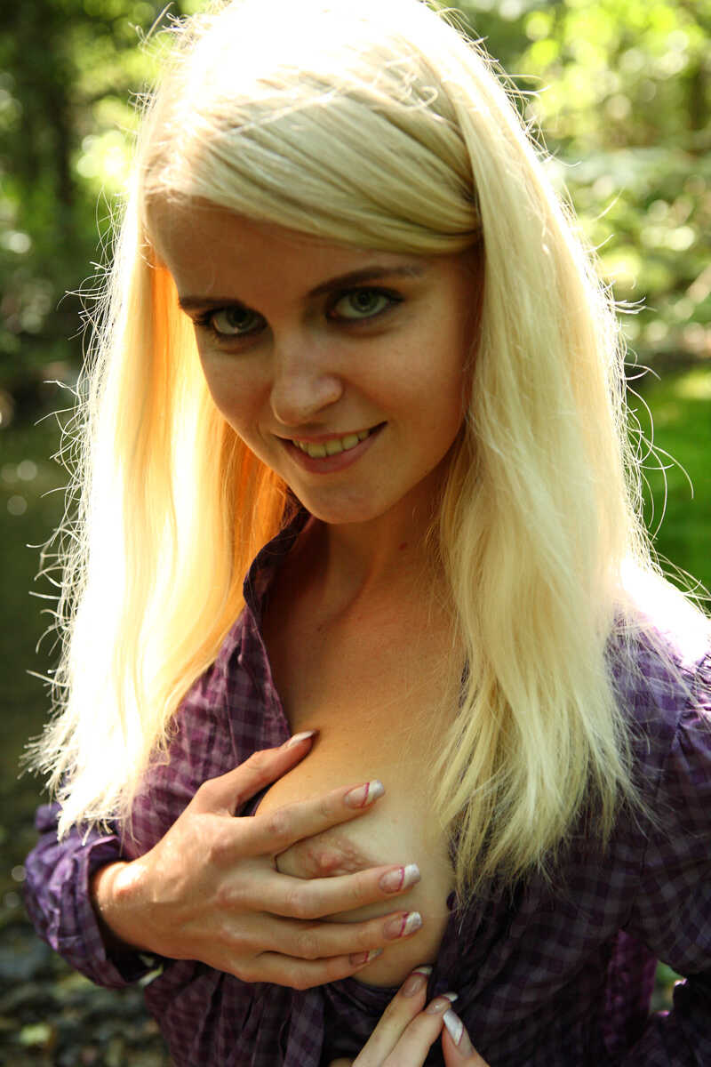 Blonde teen Danielka dips into the gentle brook for her nude modelling debut, as she poses next to a natural waterfall. - ...