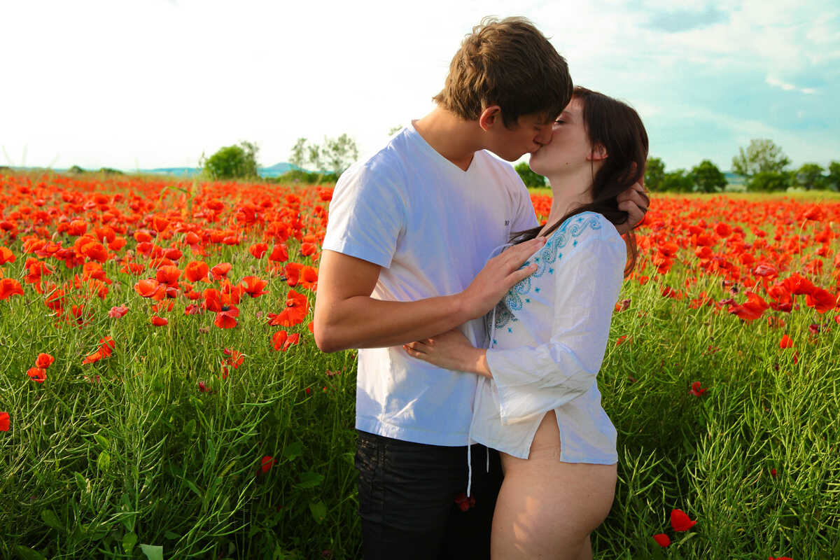 Blossoming Love: A Springtime Romp with Blooming Flowers and Young Passion