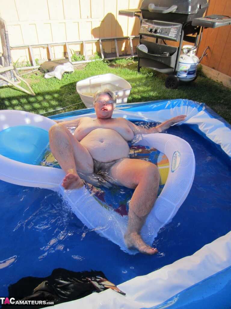 Fatty Mature Girdle Goddess Peels to Enjoy Skinny Dip with Her Very Old, Big Ass Granny Friends in the Wading Pool - Girdl...