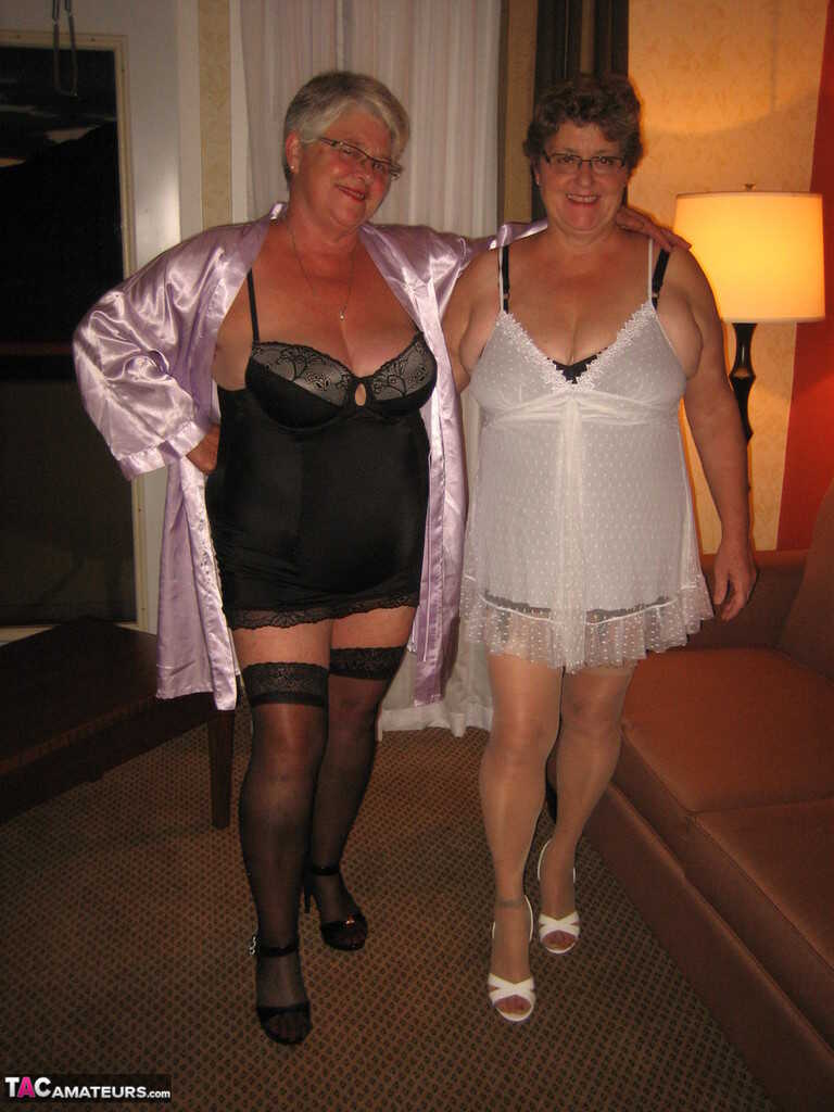 Saggy Sapphic Saga: Girdle Goddess and her Lesbian Lover Expose Their Breasts - Girdle Goddess, Sue Oliver