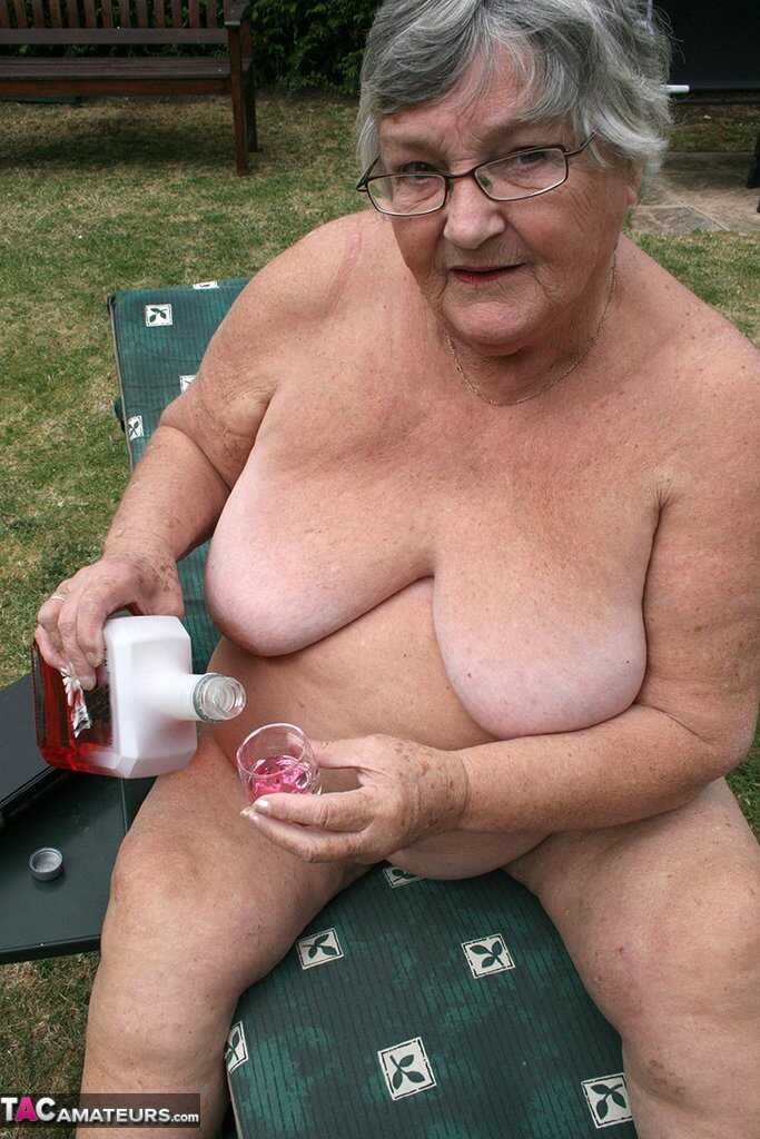 Granny Pussy Party: Libby's Fat Pussy Gets Stuffed with a Bottle in the Garden - Grandma Libby