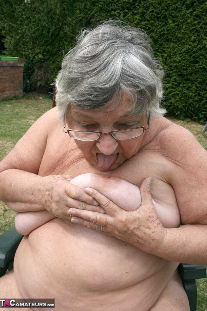 Granny Pussy Party: Libby's Fat Pussy Gets Stuffed with a Bottle in the Garden - Grandma Libby