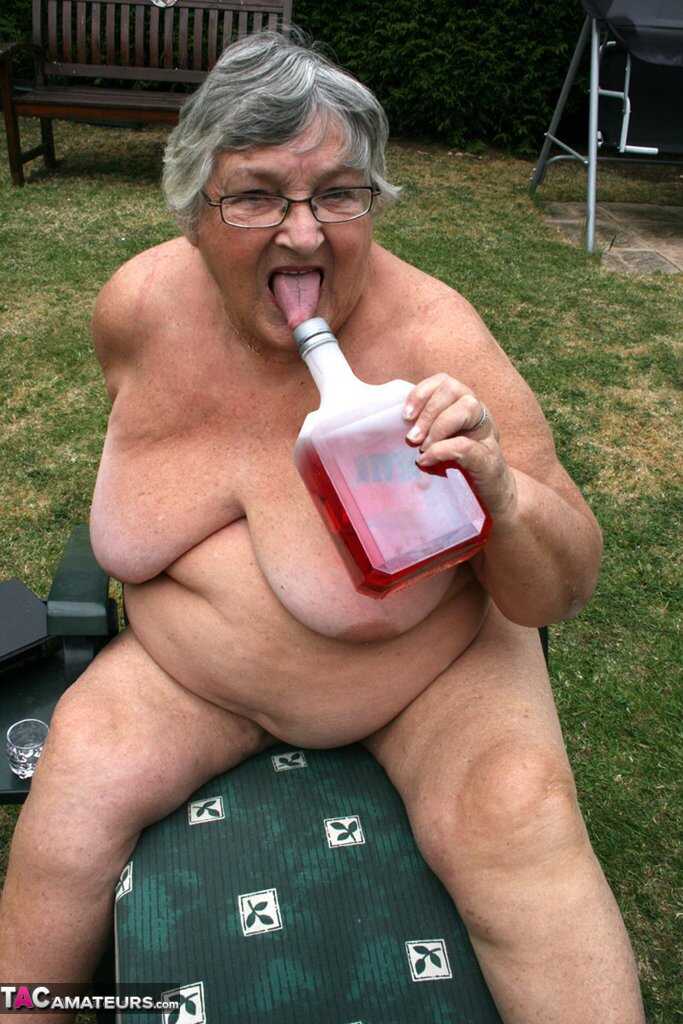 Granny Pussy Party: Libby's Fat Pussy Gets Stuffed with a Bottle in the Garden - Grandma Libby