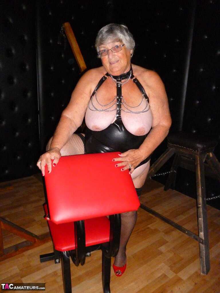 Old BBW Grandma Libby finds herself in stocks while in a dungeon