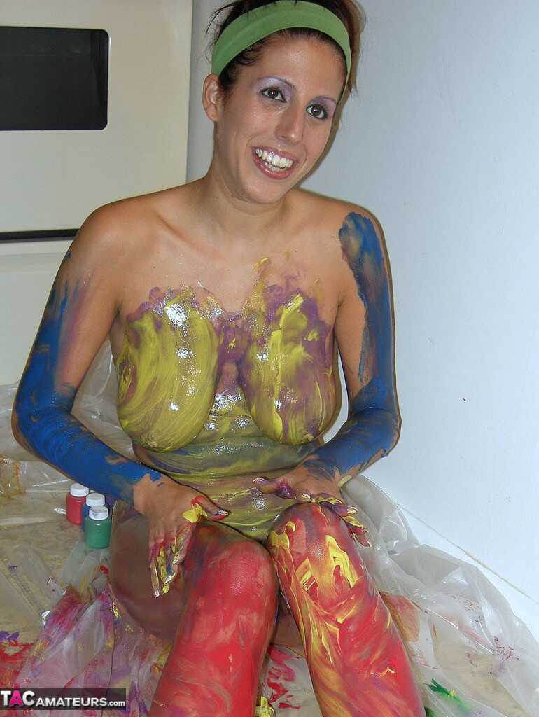 Busty amateur Lavender Rayne covers her naked body in body paint while showing off her big ass and milf solo - Lavender Rayne